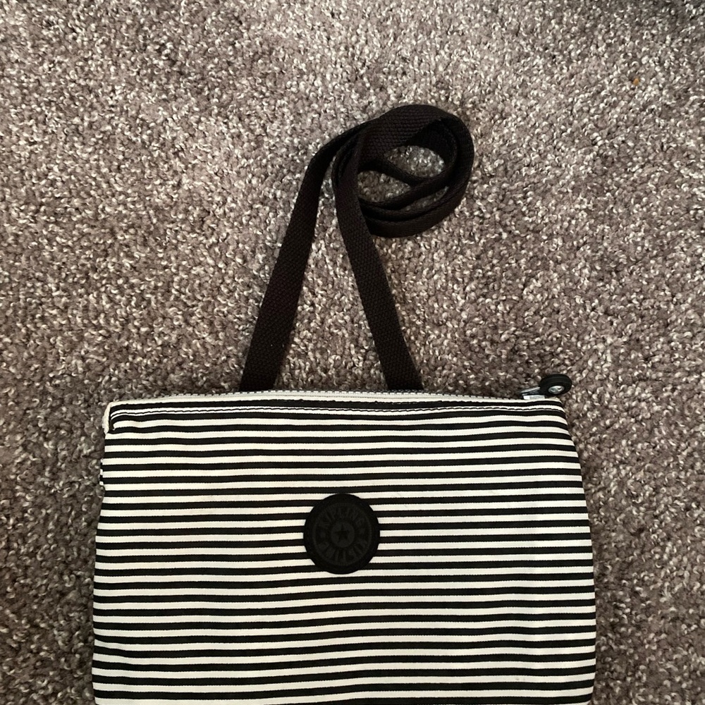 Kipling Black and White Striped Crossbody Bag. With grey monkey